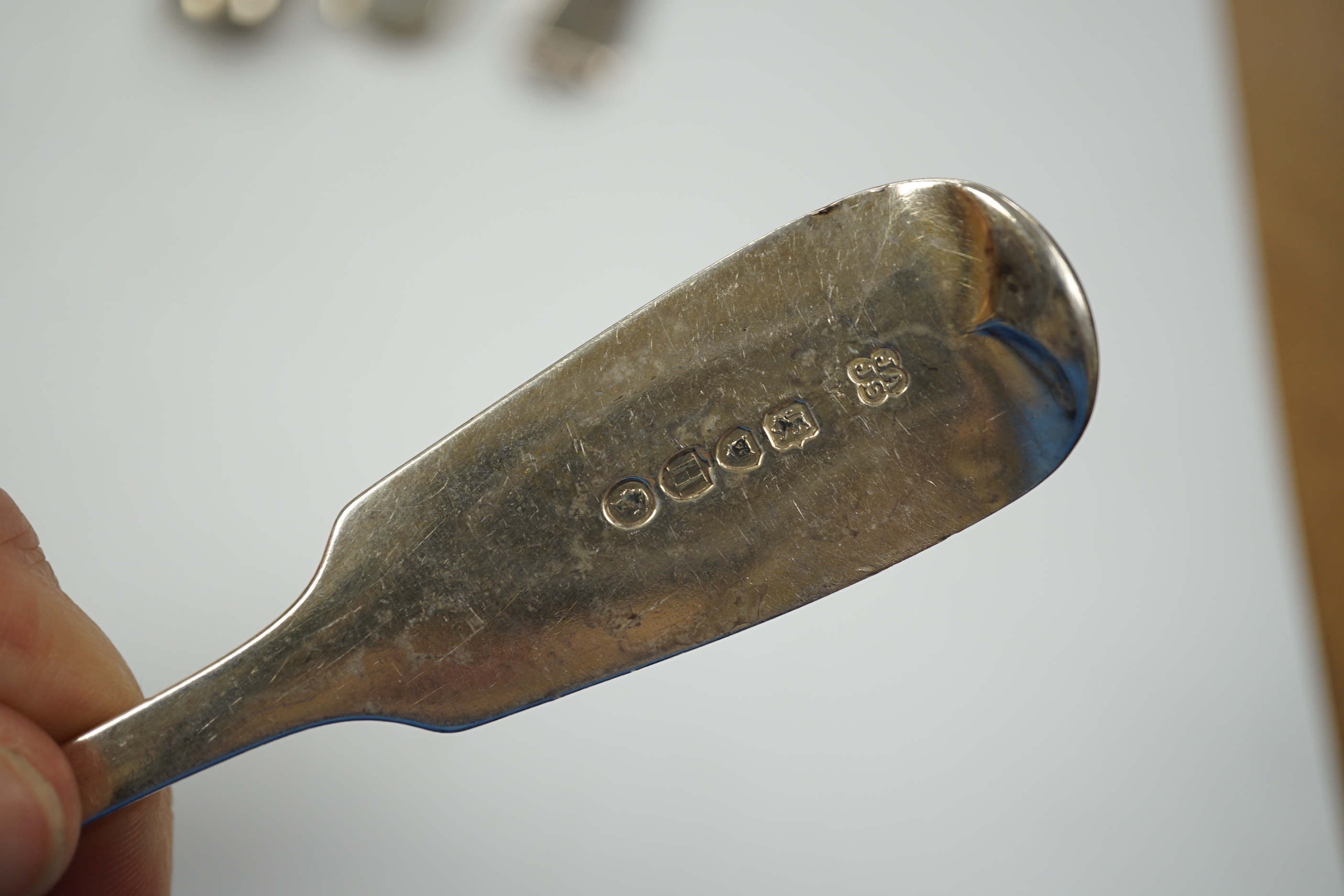 A harlequin part canteen of mainly 19th century silver fiddle pattern flatware, various dates and makers including set of six tablespoons by Aldwinckle & Slater London 1883, one other set by Henry Holland, London, 1861 a